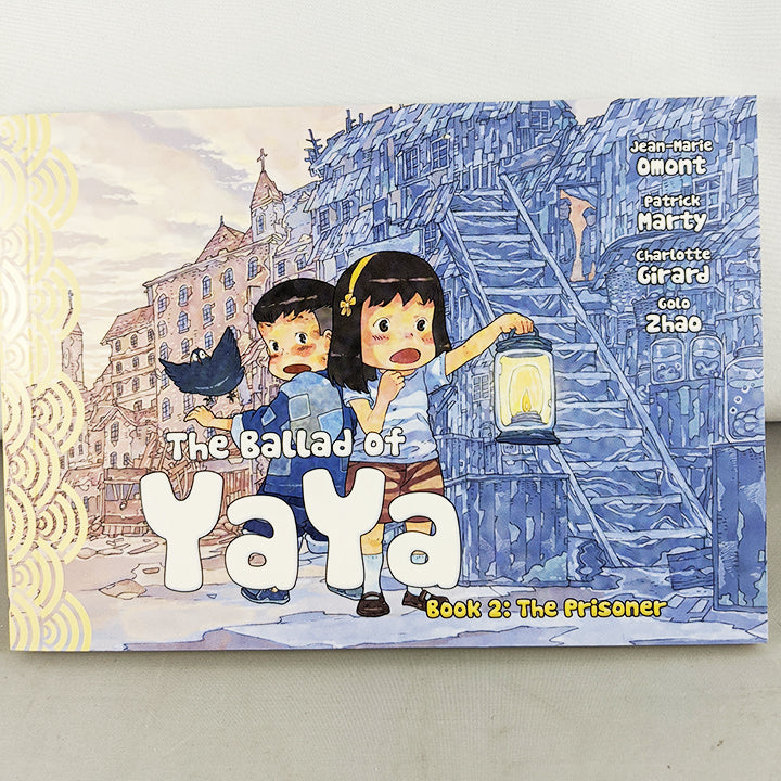 Front cover of The Ballad of Yaya Book 2: The Prisoner. Manga by Jean-Marie Omont, Patricia Marty, Charlotte Girard and Golo Zhao.