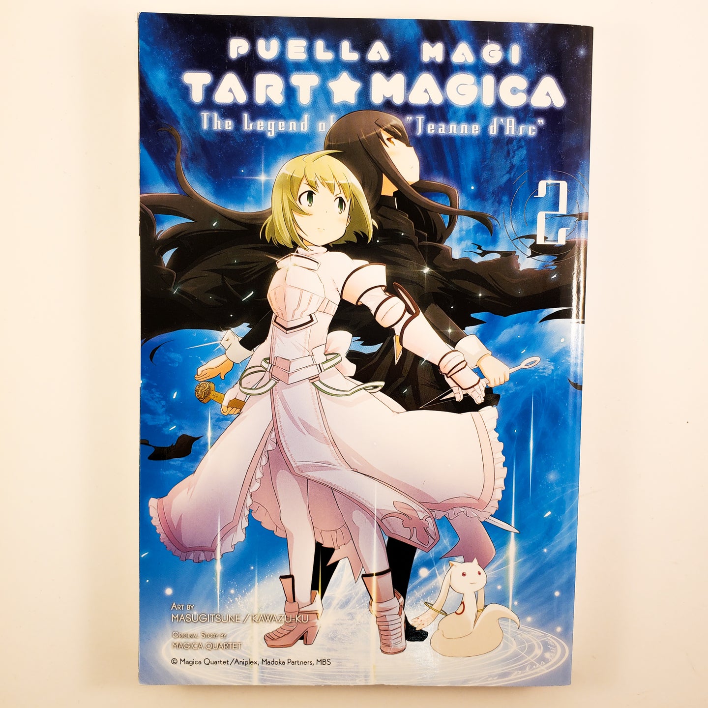 Puella Magi Tart Magica: The Legend of Jeanne d'Arc Volume 2. Manga by Masugitsune / Kawazuku and Magic Quartet.