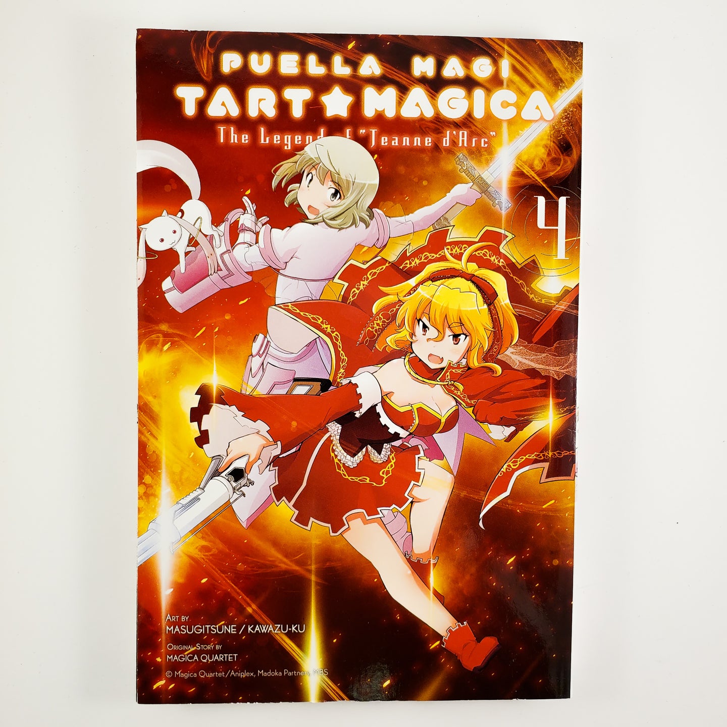 Puella Magi Tart Magica: The Legend of Jeanne d'Arc Volume 4. Manga by Masugitsune / Kawazuku and Magic Quartet.